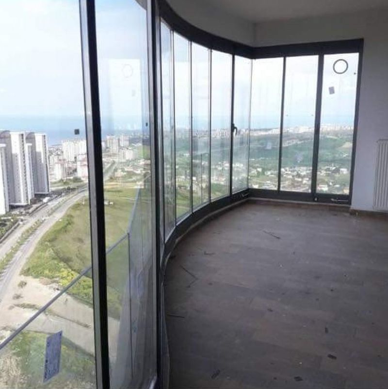 Kavisli isicamli cam balkon, yuksek kat uygulamasi
